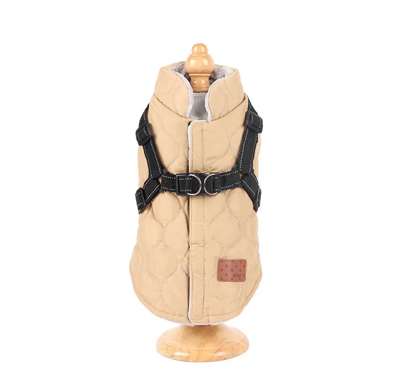 Beige dog coat with black harness on a mannequin against a white background