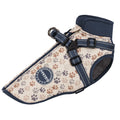 Dog harness with paw print pattern on a white background
