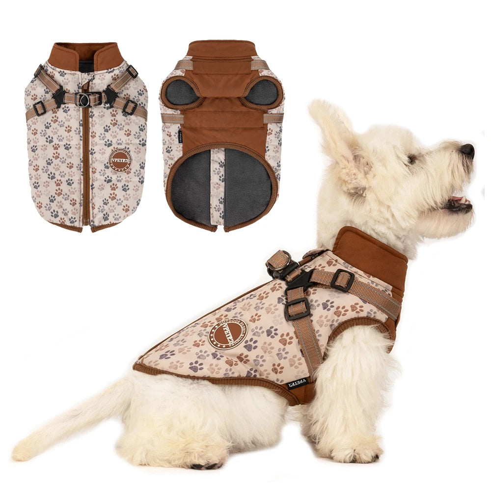 Dog wearing a floral-patterned dog harness with brown accents, next to two additional harnesses on a white background.
