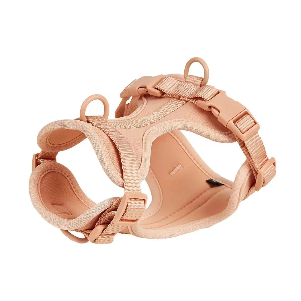 Pink dog harness on a white background