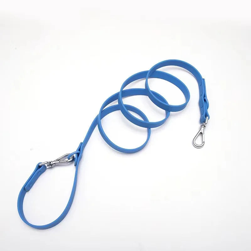 Blue dog leash with metal clip on a white background