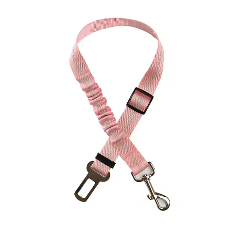 Pink dog car seat belt with metal clip on a white background