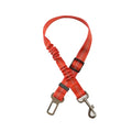 Red dog leash with a metal clip on a white background
