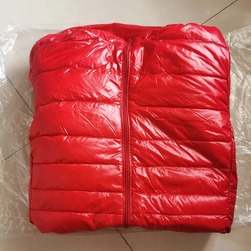 Red puffer vest on a light-colored floor