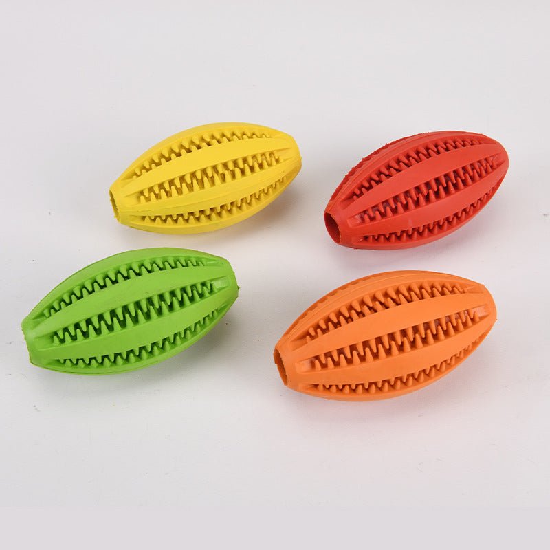 Four colorful dog toys with textured surfaces on a white background