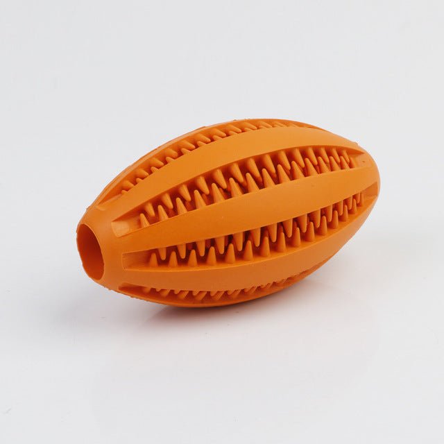 Orange dog toy with textured surface on a white background