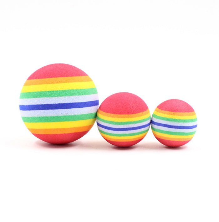 Three colorful striped balls on a white background