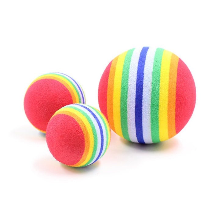 Three colorful striped balls on a white background
